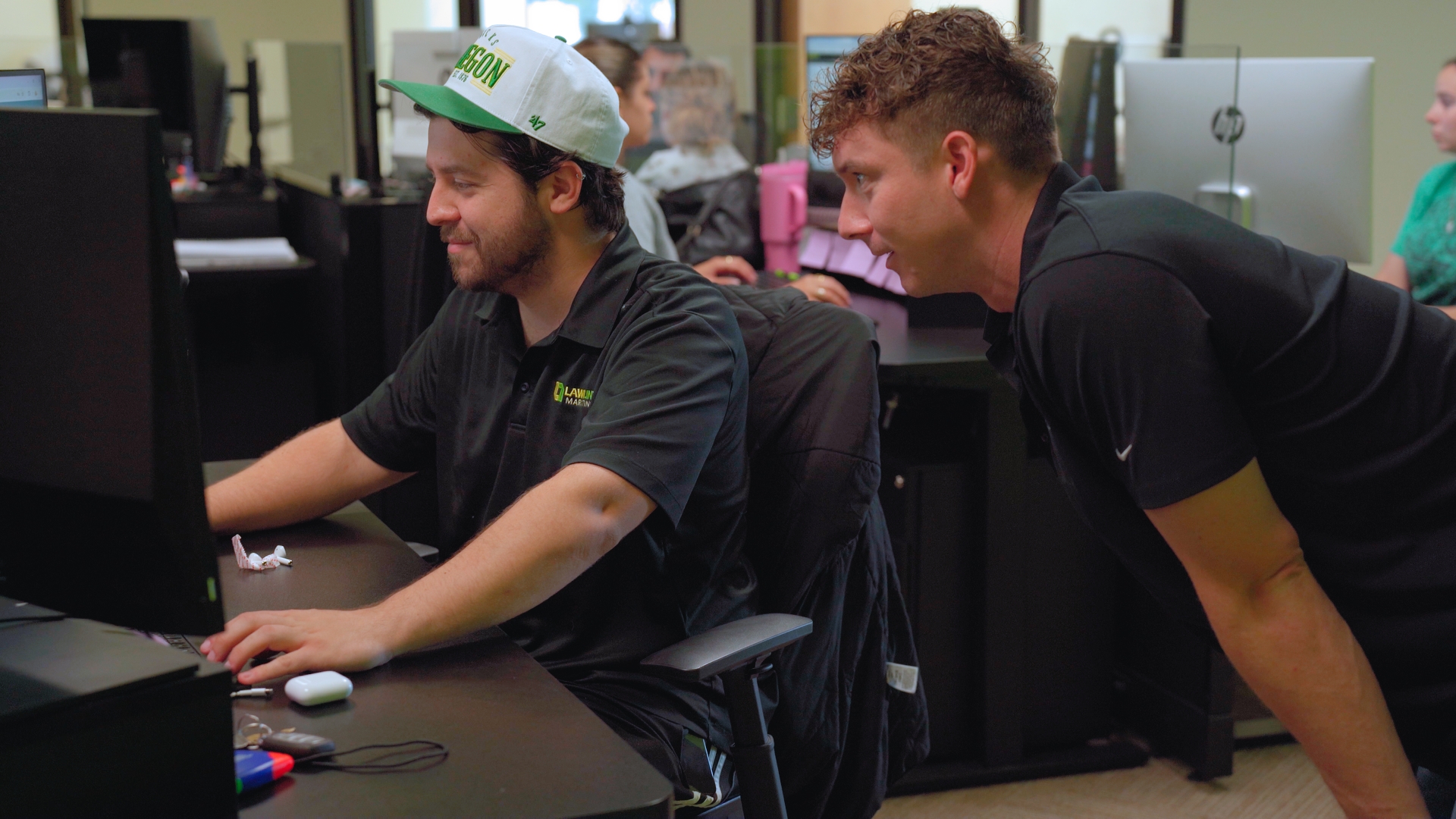 Lawnline Marketing team members in strategy meeting